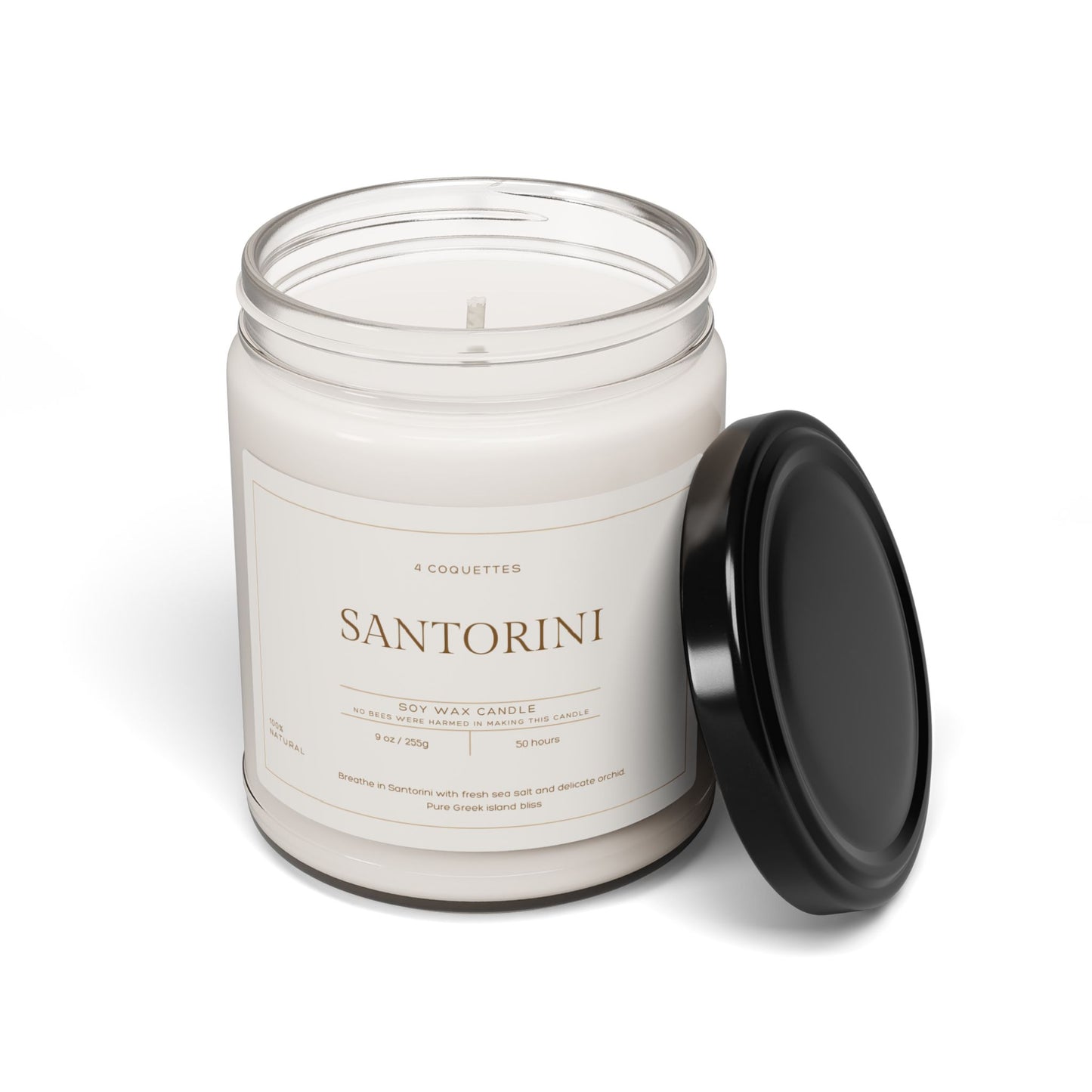 A clear glass jar holds an eco-friendly candle labeled Santorini. This Santorini scented candle has a black lid resting beside it. The label features 4 Coquettes and details the burn time and net weight, evoking Greek island bliss with every flicker. Perfect for Martin Luther King Jr. Day 2025